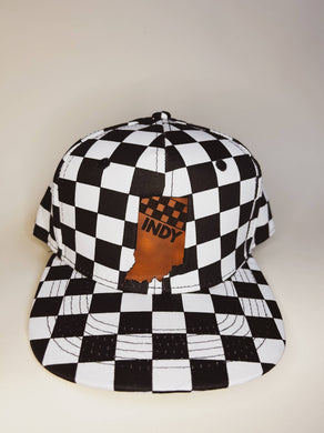 Black and white checkered kids hat with leather patch of the shape of Indiana and the word INDY in black with a checkered flag.  
