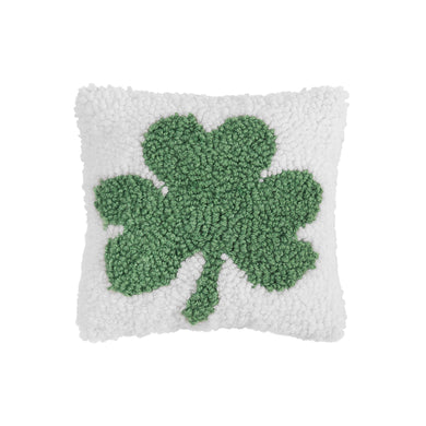 White acrylic throw pillow with a green shamrock on front. 8X8