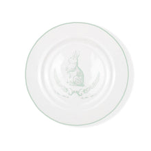 Load image into Gallery viewer, Bunny plate features a white plate with light blue outline and blue bunny and laurel wreath on inside of plate.  
