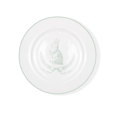 Bunny plate features a white plate with light blue outline and blue bunny and laurel wreath on inside of plate.  