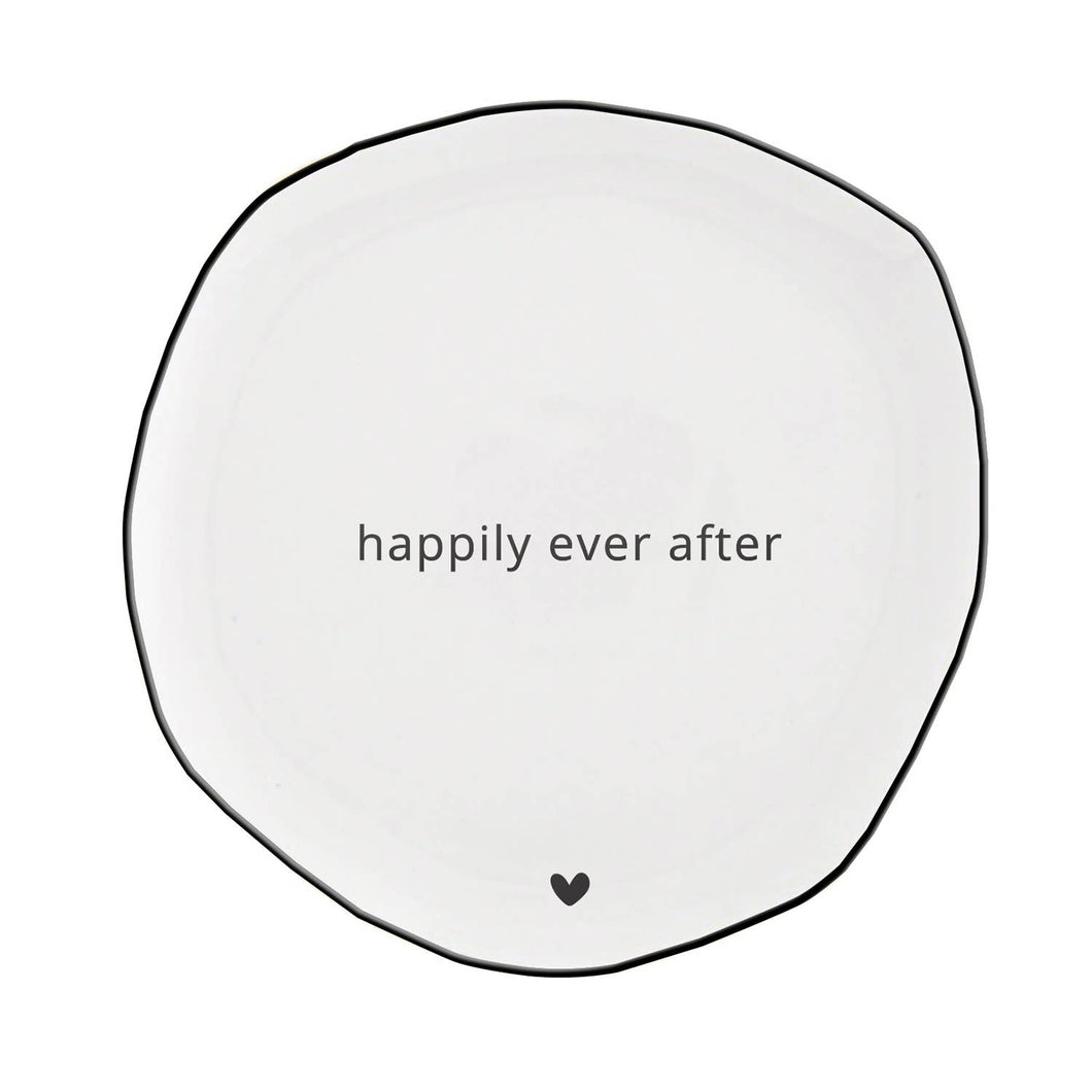 White, not perfectly round plate outlined in black with the words 